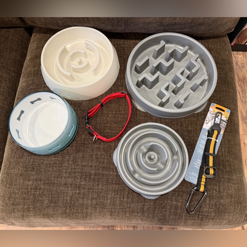Lot of puppy/dog supplies includes slow feeding bowls, collar & seatbelt harness